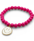 Pinkes Perlenarmband mit großem weißen Smiley Anhänger - Im Sauerland kaufen!
