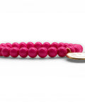 Pinkes Perlenarmband mit großem weißen Smiley Anhänger - Im Sauerland kaufen!