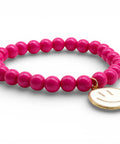 Pinkes Perlenarmband mit großem weißen Smiley Anhänger - Im Sauerland kaufen!