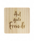 Untersetzer aus Holz mit Lasergravur "Auf gute Freunde"